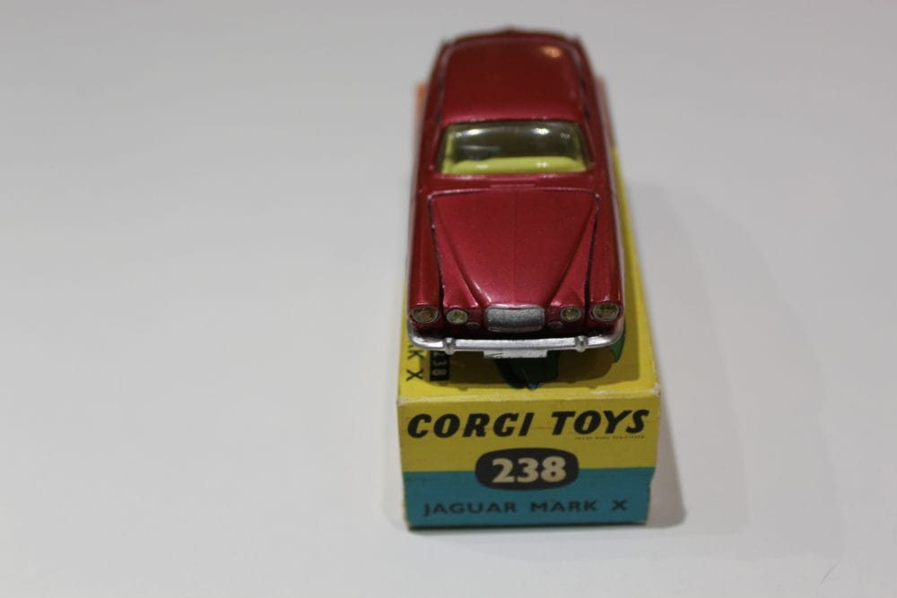 Vintage Corgi Toys 238 Jaguar Mark 10 diecast model car on box.