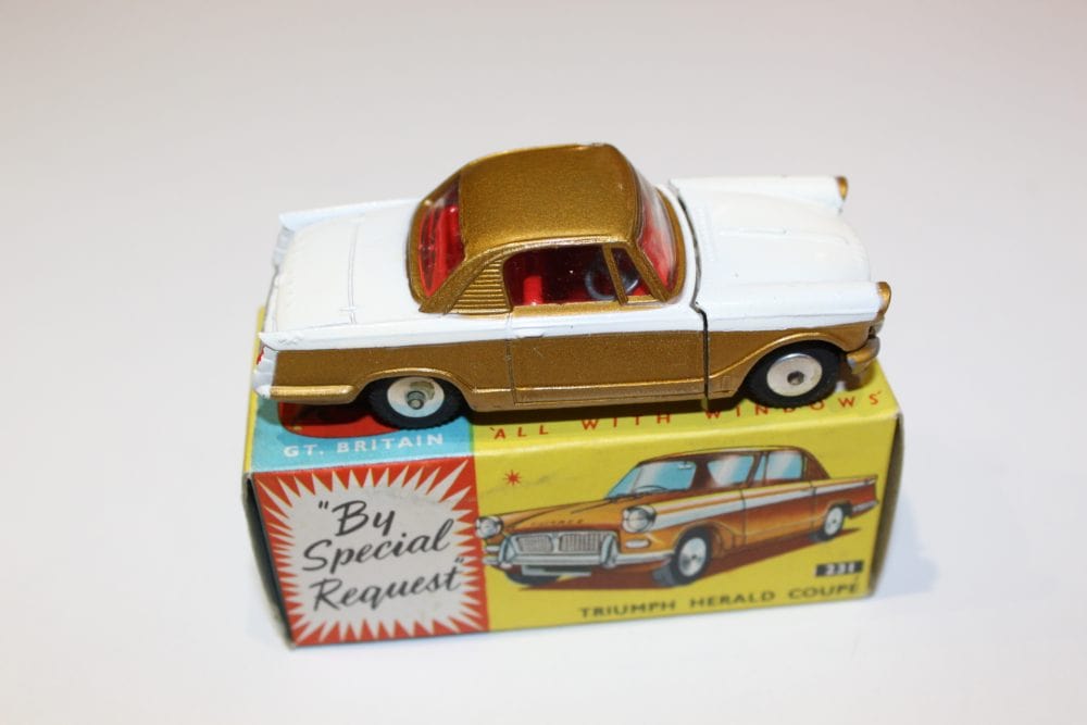 Vintage Corgi Triumph Herald Coupe diecast model on original box.