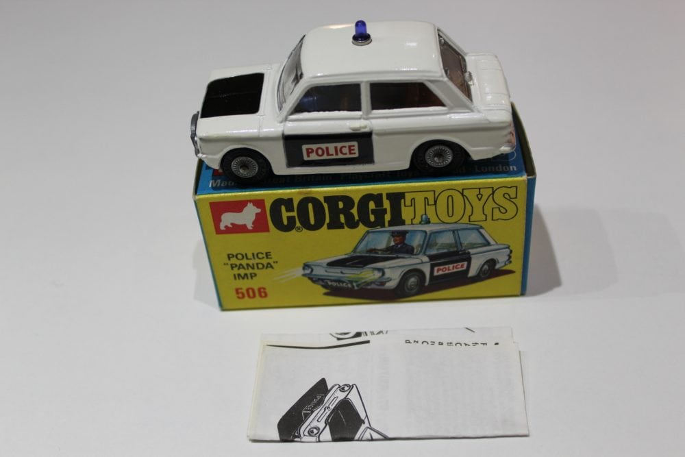 Detailed Corgi Toys 506 Police Panda Imp diecast model with packaging.