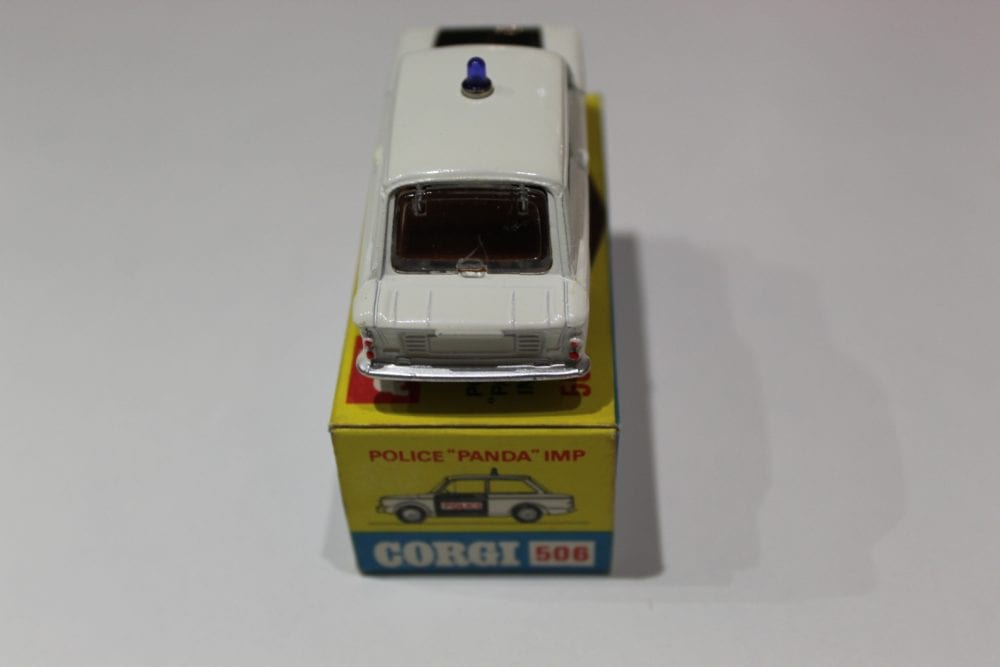 Corgi 506 Police Panda Imp diecast model car on its original box, detailed toy vehicle for collector.