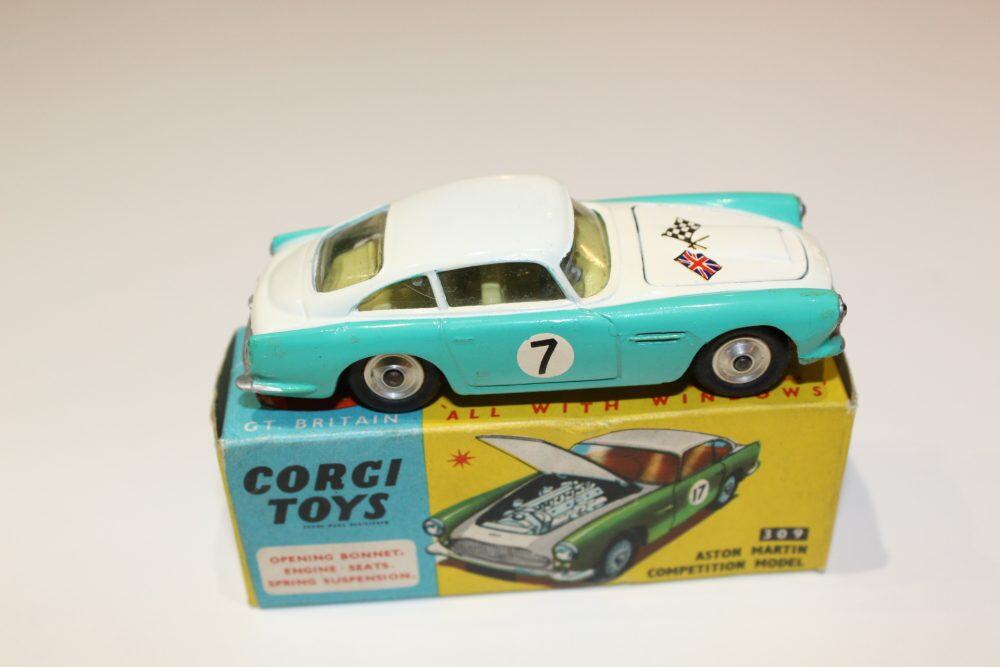Vintage Corgi Toys 309 Aston Martin DB4 diecast model with racing decals and box.