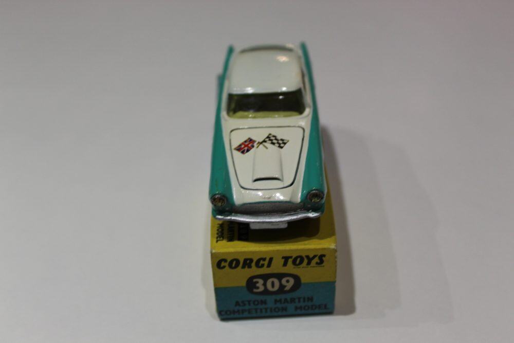 A detailed Corgi Toys 309 Aston Martin DB4 model car on its original box, part of the RN7 series.
