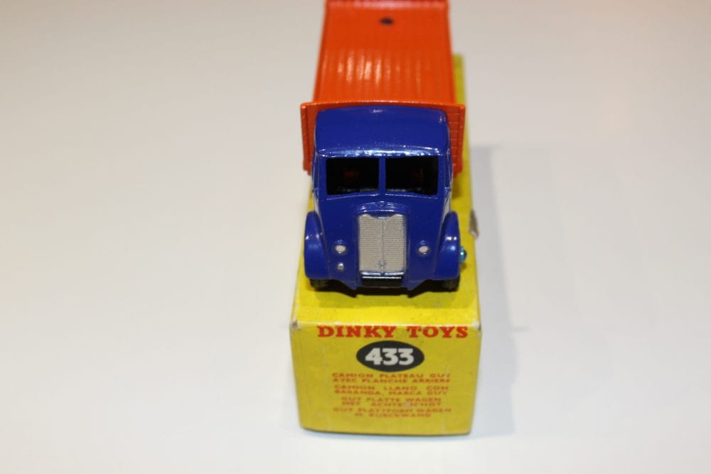 Vintage Dinky Toys Guy Tailboard Lorry model, collectible diecast vehicle for enthusiasts.