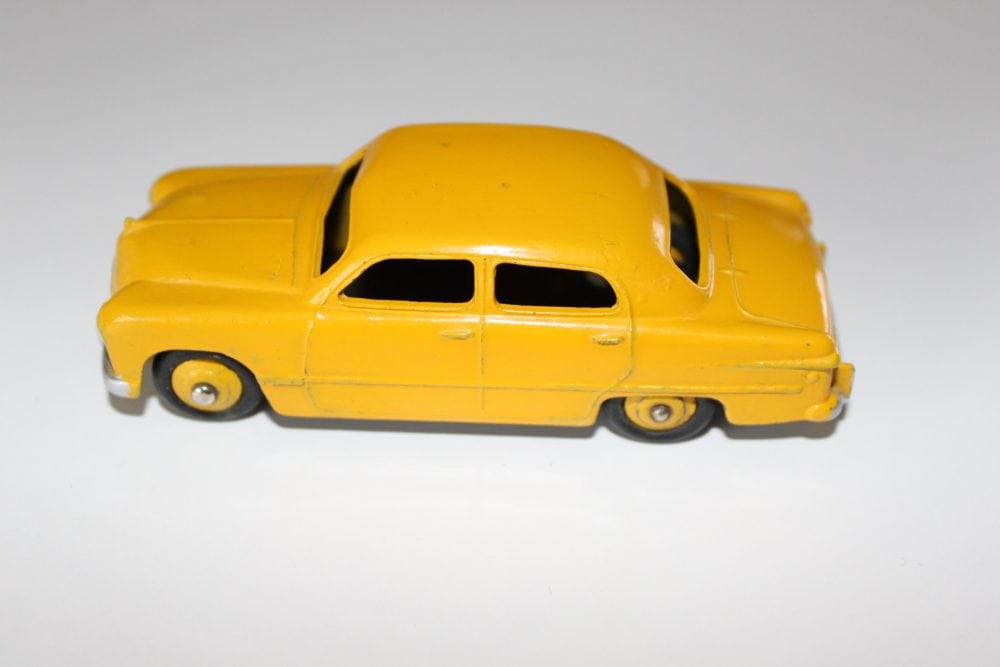 Vintage yellow Dinky Toys 139a Ford Forder diecast model car for collectors.