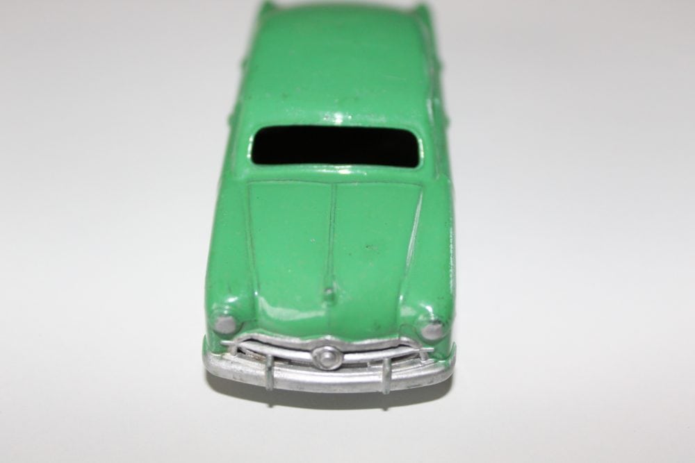 Vintage green Dinky Toys Ford Forder diecast model car for collectors.