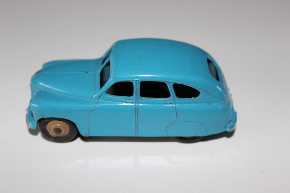 Vintage blue Dinky Toys 153 Standard Vanguard model car for collectors.