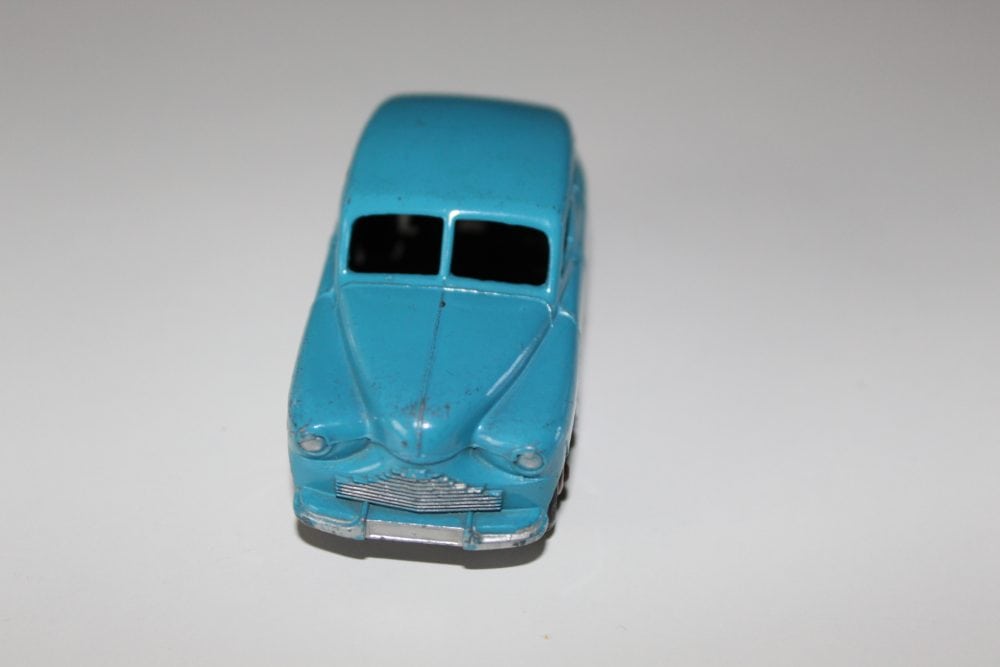 Vintage Dinky Toys 153 Standard Vanguard diecast model car for collectors.