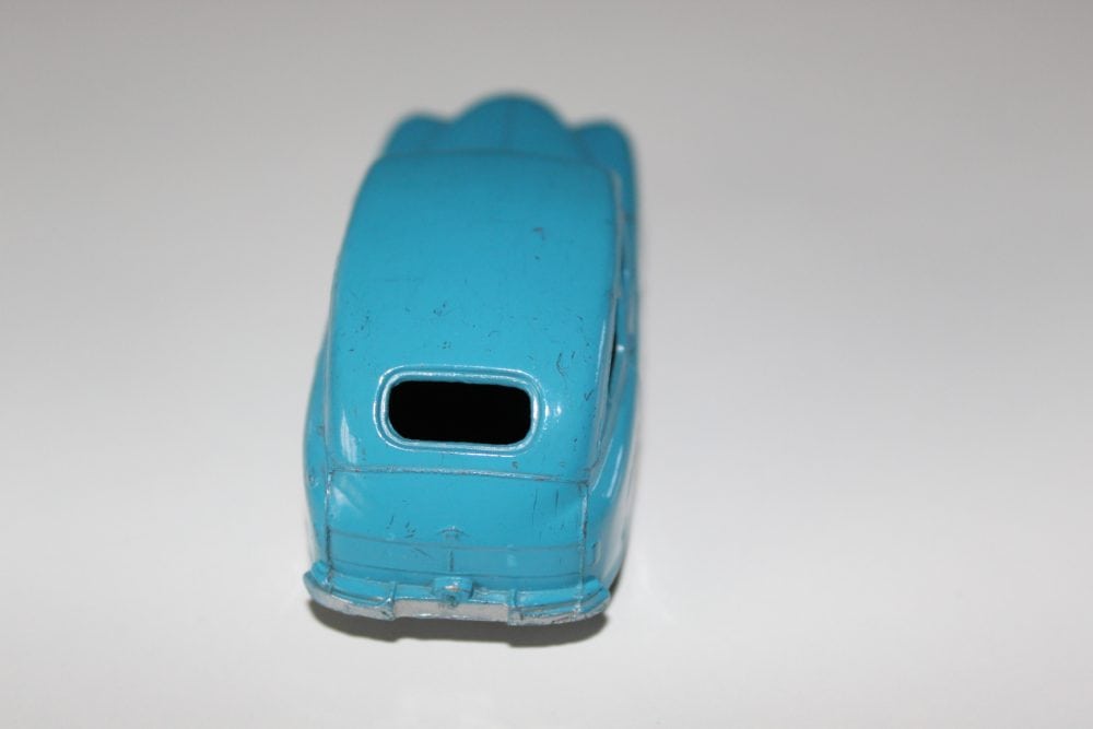 Vintage blue Dinky Toys 153 Standard Vanguard diecast model car.