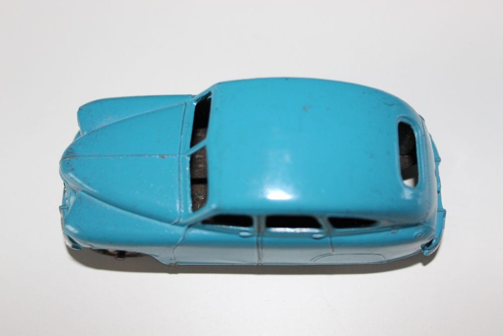 Vintage Dinky Toys 153 Standard Vanguard diecast model car for collectors.
