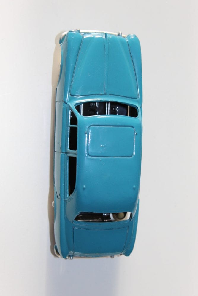 Vintage blue Dinky Toys Peugeot 403 model car, French diecast collectible.