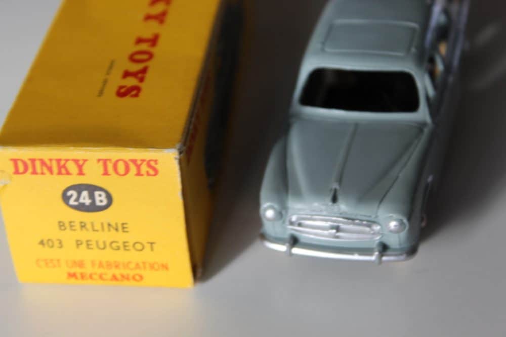 Dinky Toys 24B Peugeot 403 Berline vintage diecast model with box.