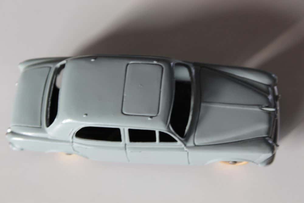 Vintage Dinky Toys Peugeot 403 Berline diecast car, grey color, detailed miniature vehicle.