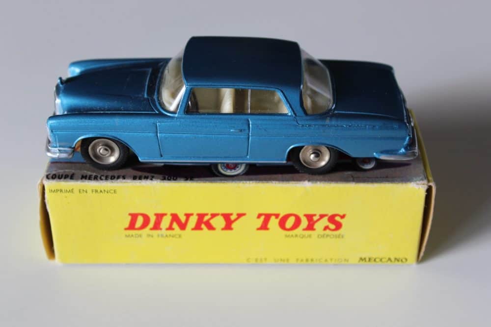 Vintage Dinky Toys French Mercedes Benz 300 SE Coupe model in blue.