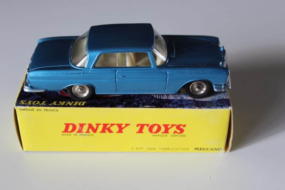 Vintage Dinky Toys Mercedes Benz 300 SE Coupe model in blue, on original box.