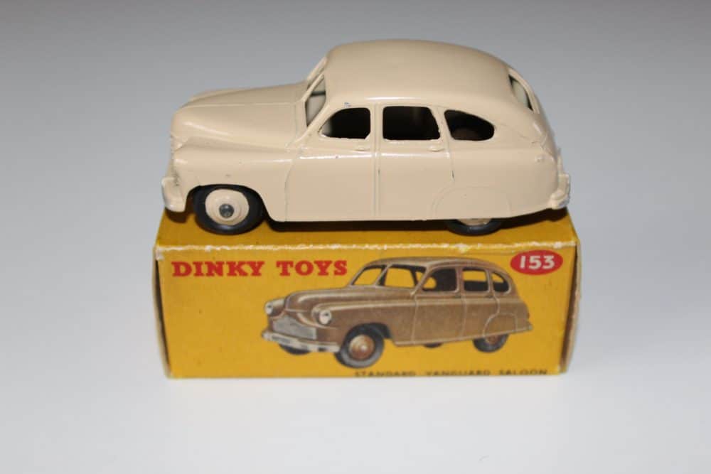 Dinky Toys 153 Standard Vanguard vintage diecast model car on box.