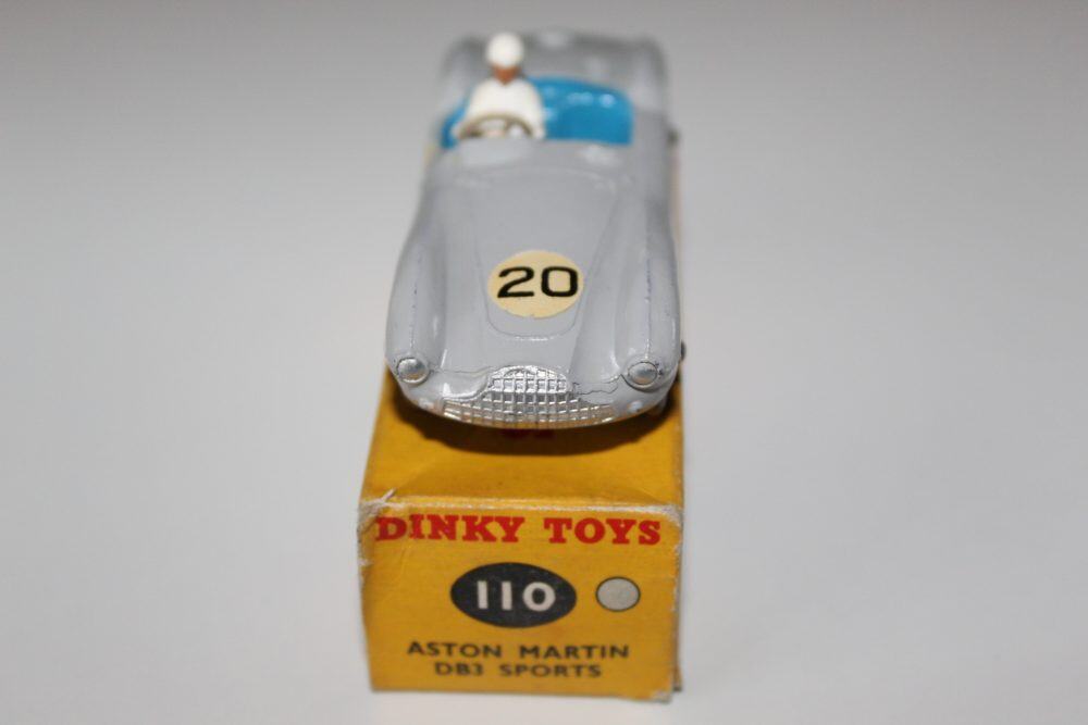 Vintage Dinky Toys 110 Aston Martin DB3 Sports model car with driver figure.