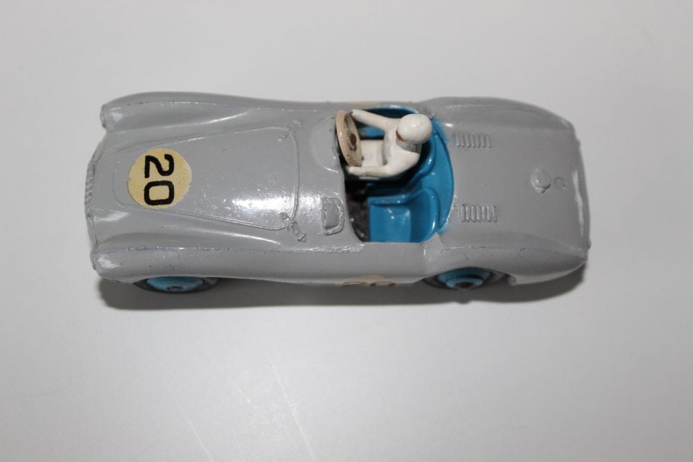 Vintage Dinky Toys 110 Aston Martin DB3 Sports model car, grey with blue interior.