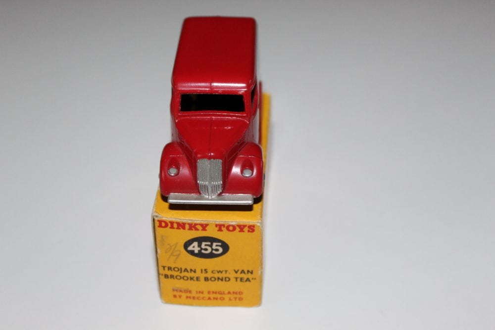 Vintage Dinky Toys 455 Trojan Brooke Bond Van model on display.