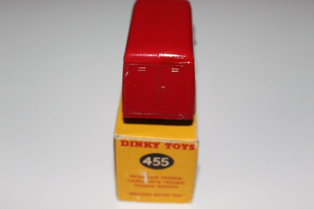 Dinky Toys 455 Trojan Brooke Bond Van model in red and yellow, collectible vintage toy vehicle.