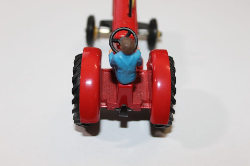 Vintage Dinky Toys Massey Ferguson tractor model for collectors.