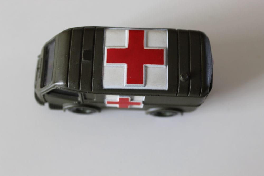 Vintage Dinky Toys 807 Renault all terrain military ambulance with red cross.
