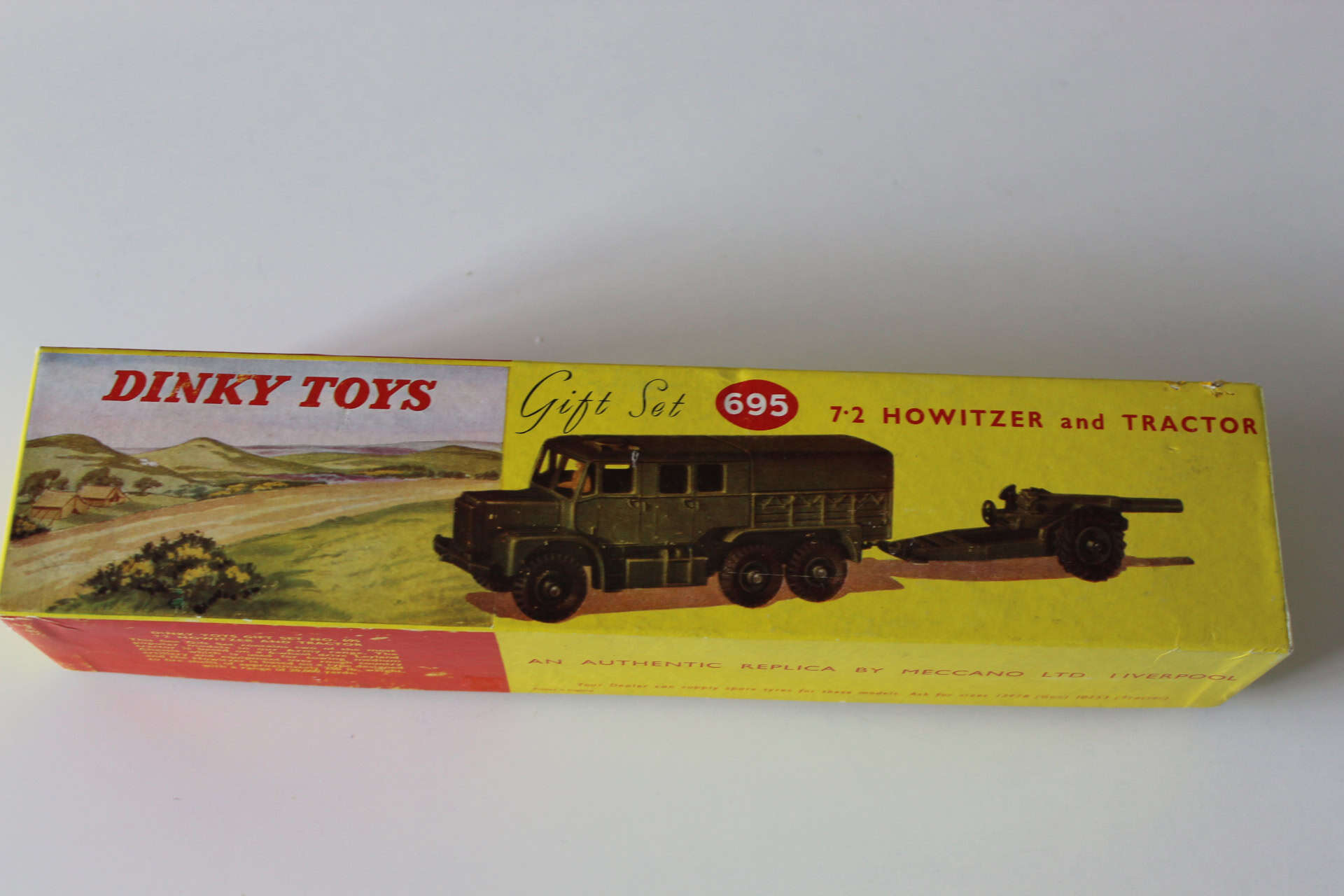 Dinky Toys 695 gift set featuring a 7.2 howitzer and tractor in original box.