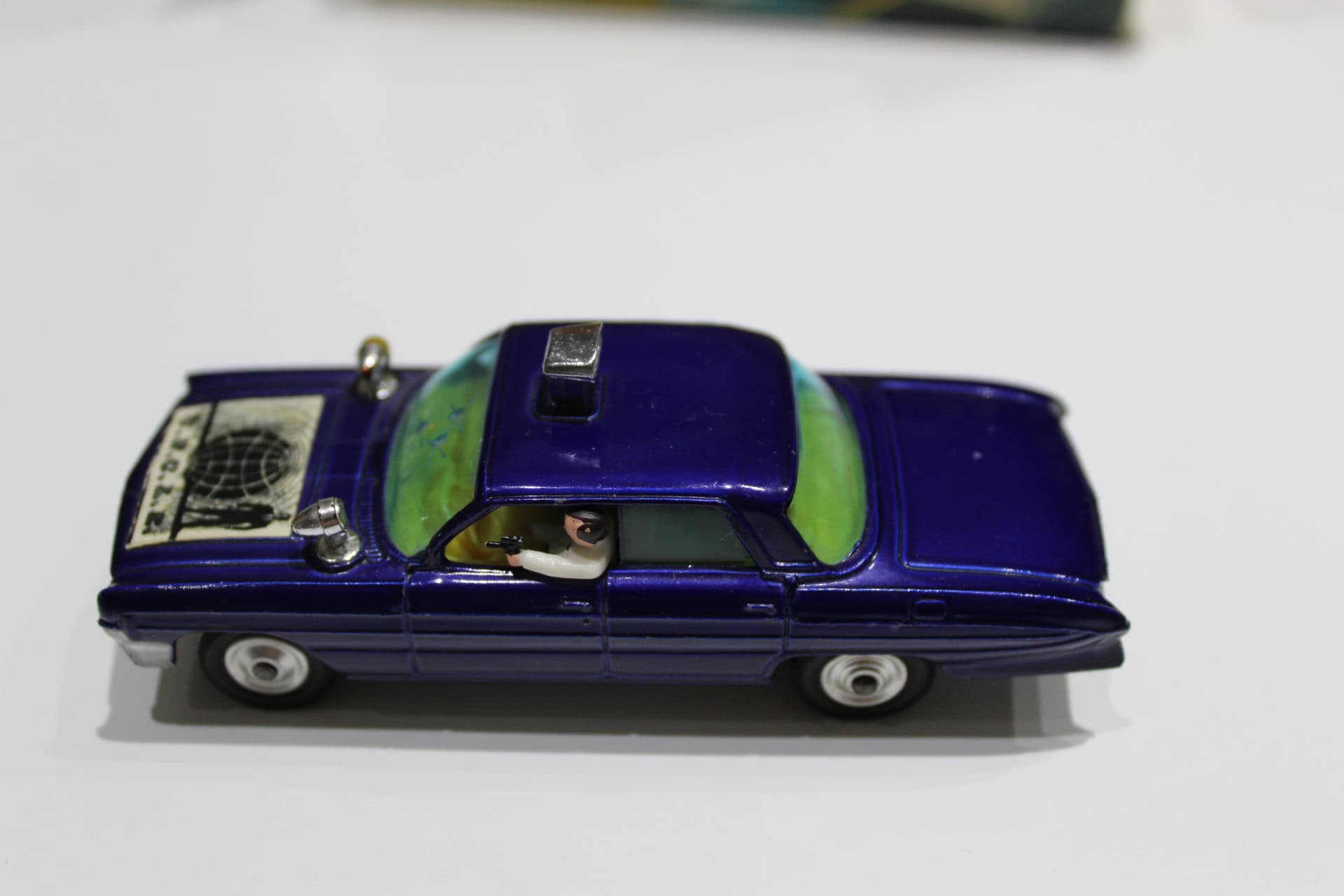Vintage Corgi Thrushbuster toy car from The Man From U.N.C.L.E. series, blue model with detailed int.