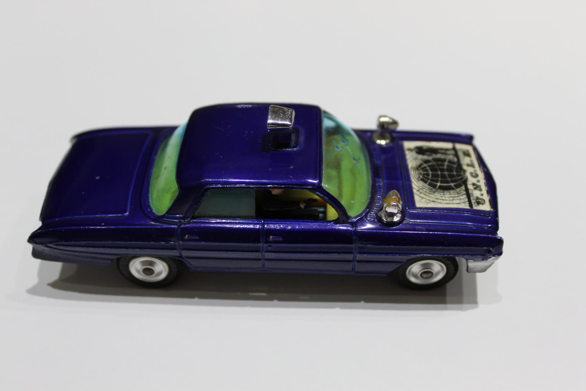 Detailed Corgi Thrushbuster diecast model from The Man From U.N.C.L.E. series, blue with logo on hoo.