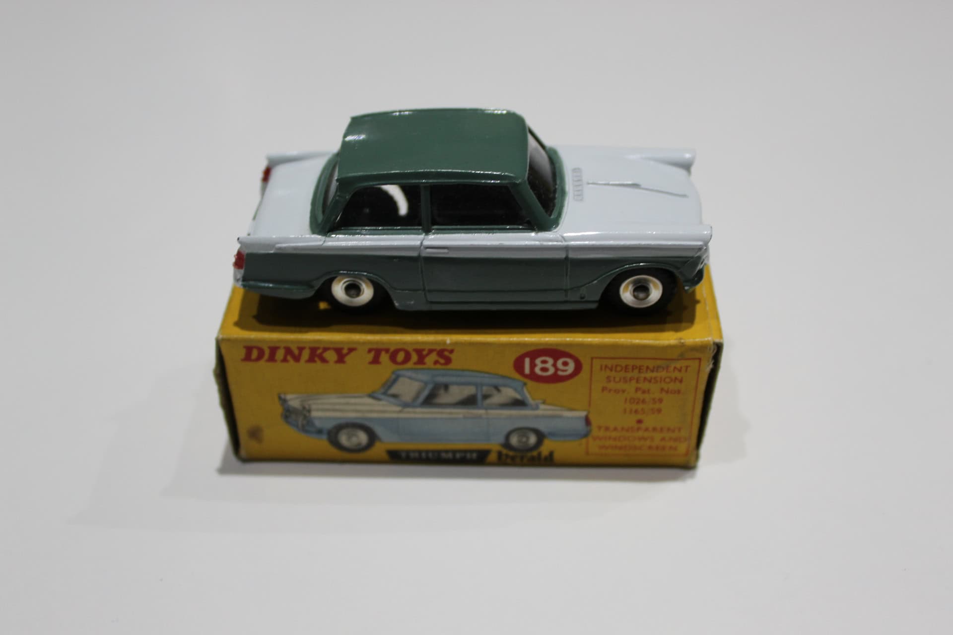 Vintage Dinky Toys 189 Triumph Herald model on original box.