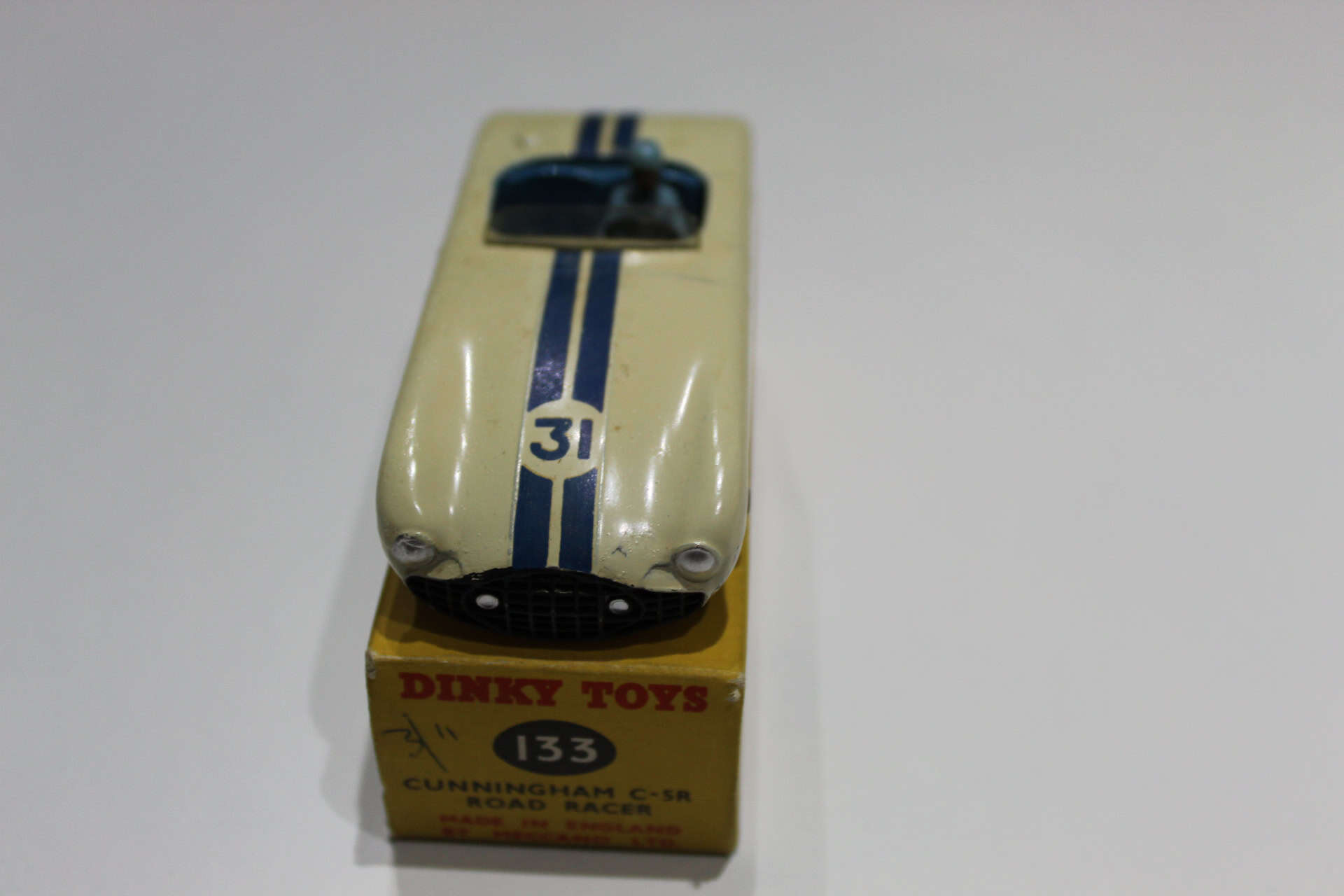Dinky Toys 133 Cunningham C5-R racing car model from the 1960s, detailed vintage diecast toy.