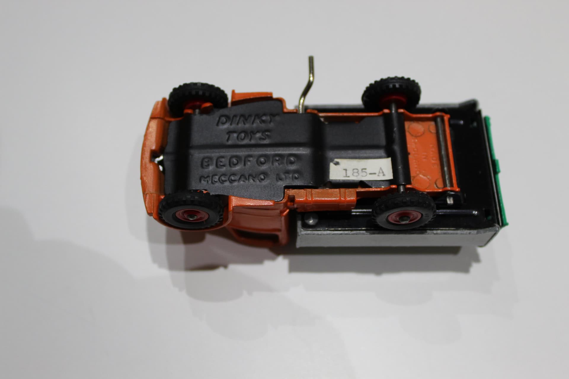 Vintage Dinky Toys refuse wagon model, detailed miniature garbage truck for collectors.