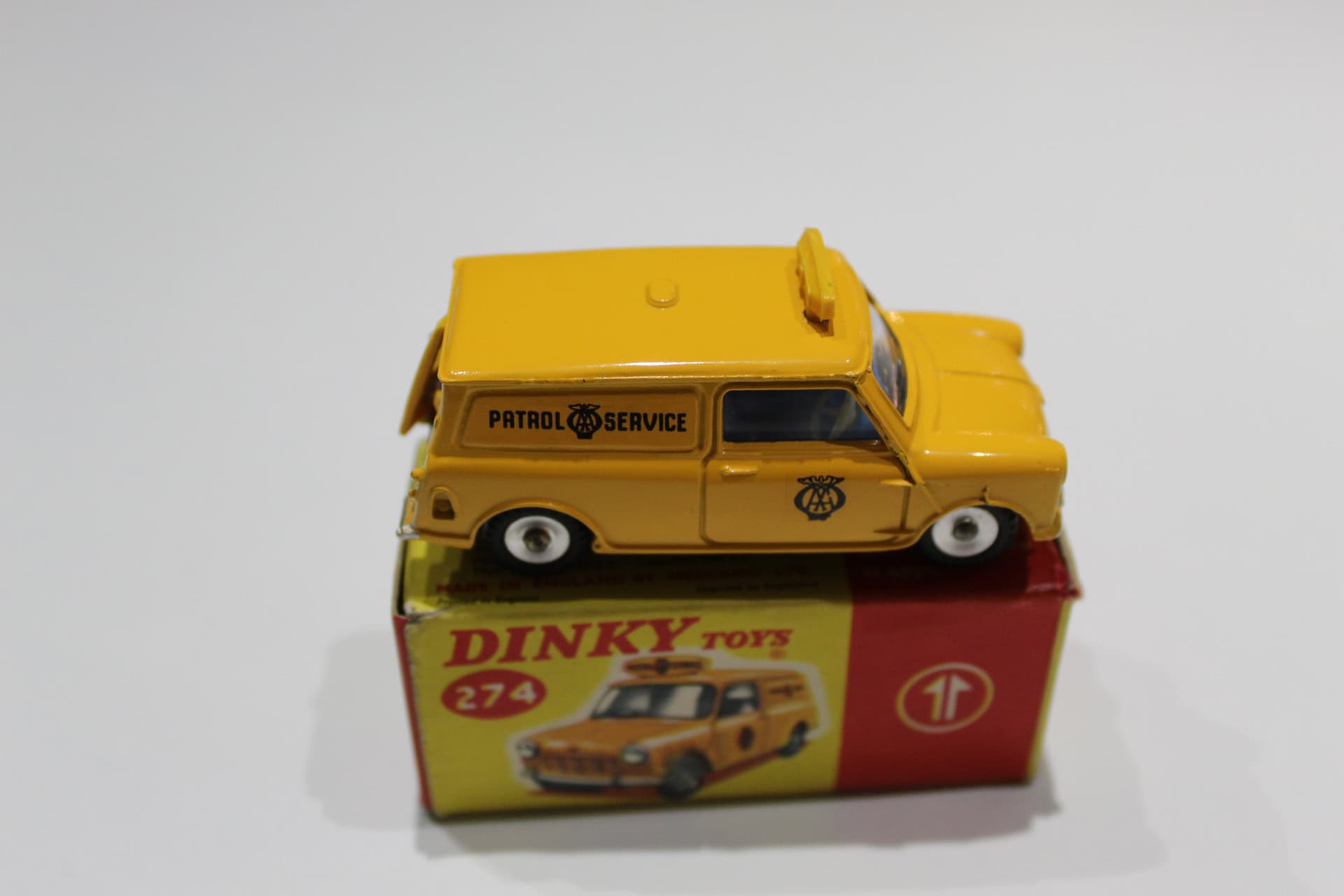 Dinky Toys 274 A.A. Mini Van diecast model on its original box, vintage toy vehicle.