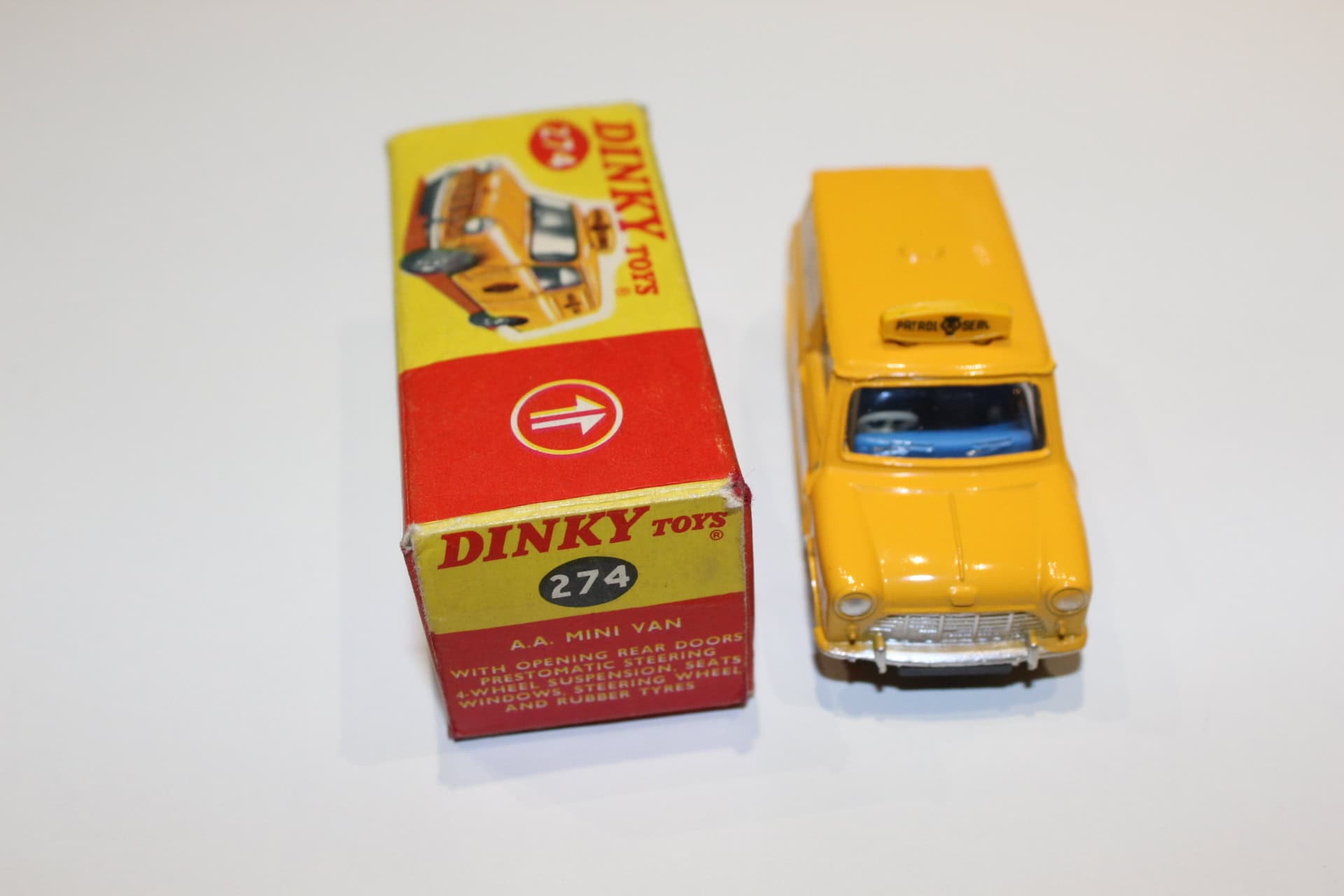 Vintage Dinky Toys 274 A.A. Mini Van model in yellow with original box.