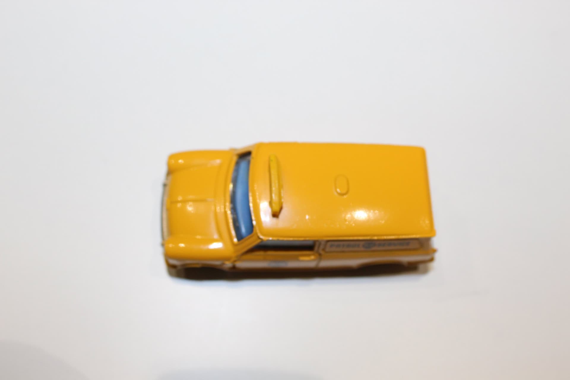 Mini yellow van toy from Dinky Toys 274 A.A. collection.