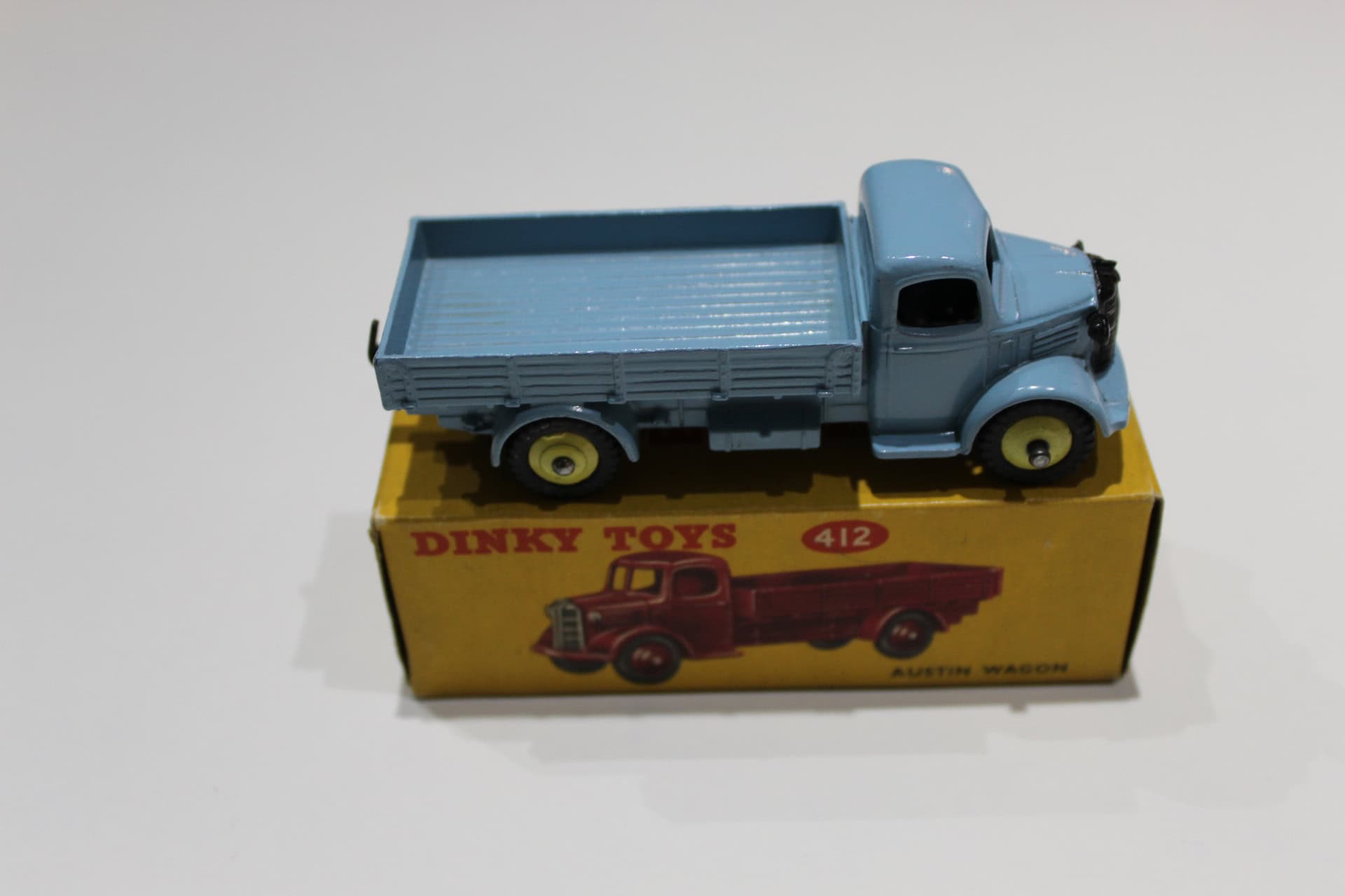 Vintage Dinky Toys 412 Austin Wagon diecast model on original box.