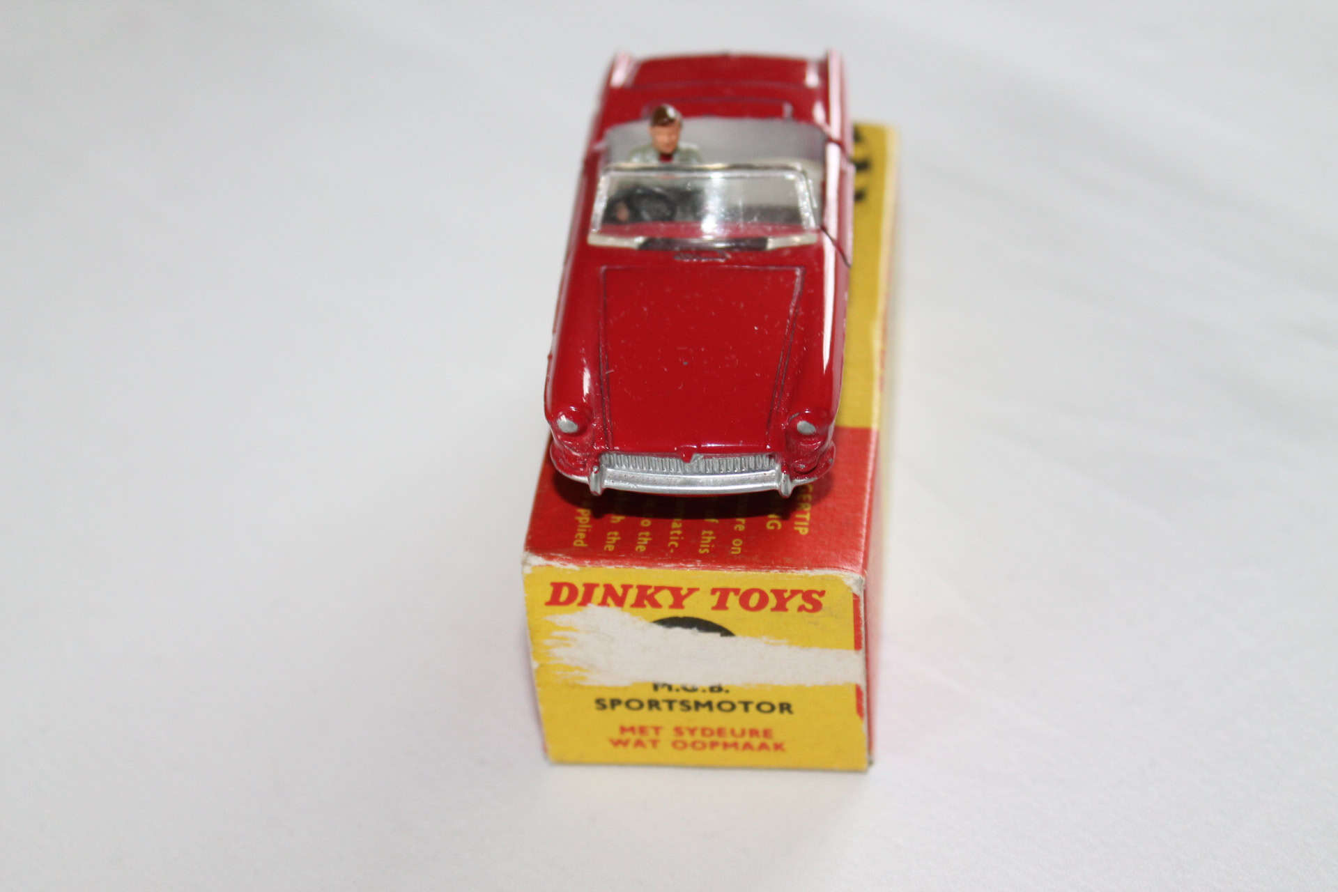 Vintage Dinky Toys 113 M.G.B. sports car model on original box, rare South African issue.
