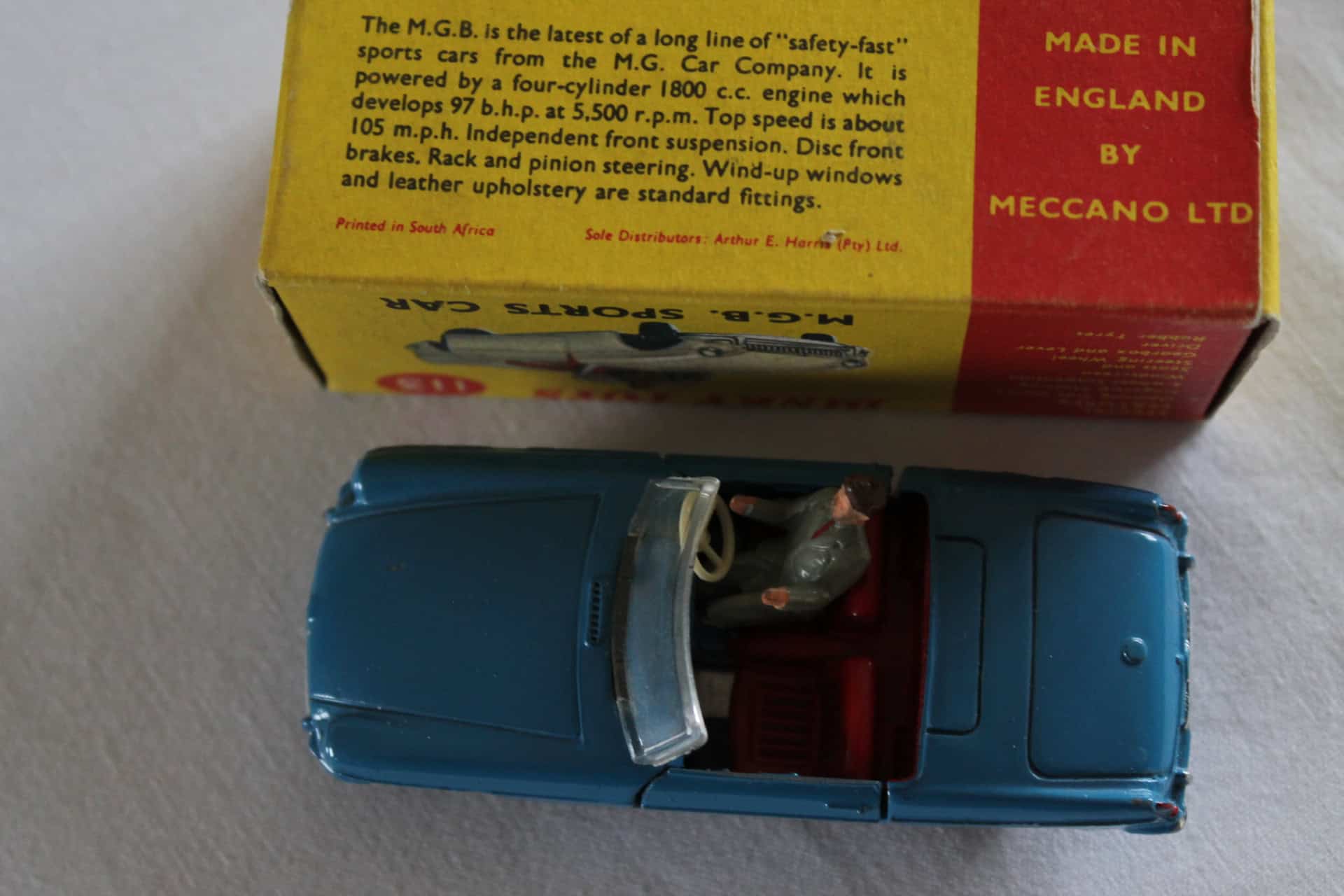 Dinky Toys 113 M.G.B. sports car model, rare South African issue, detailed diecast collectible.