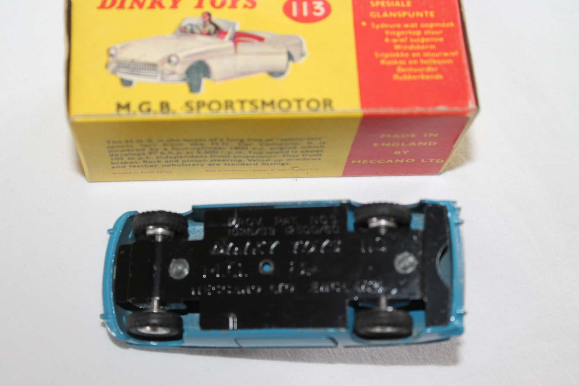 Vintage Dinky Toys 113 M.G.B. sports car model, rare South African issue, collectible diecast vehicl.