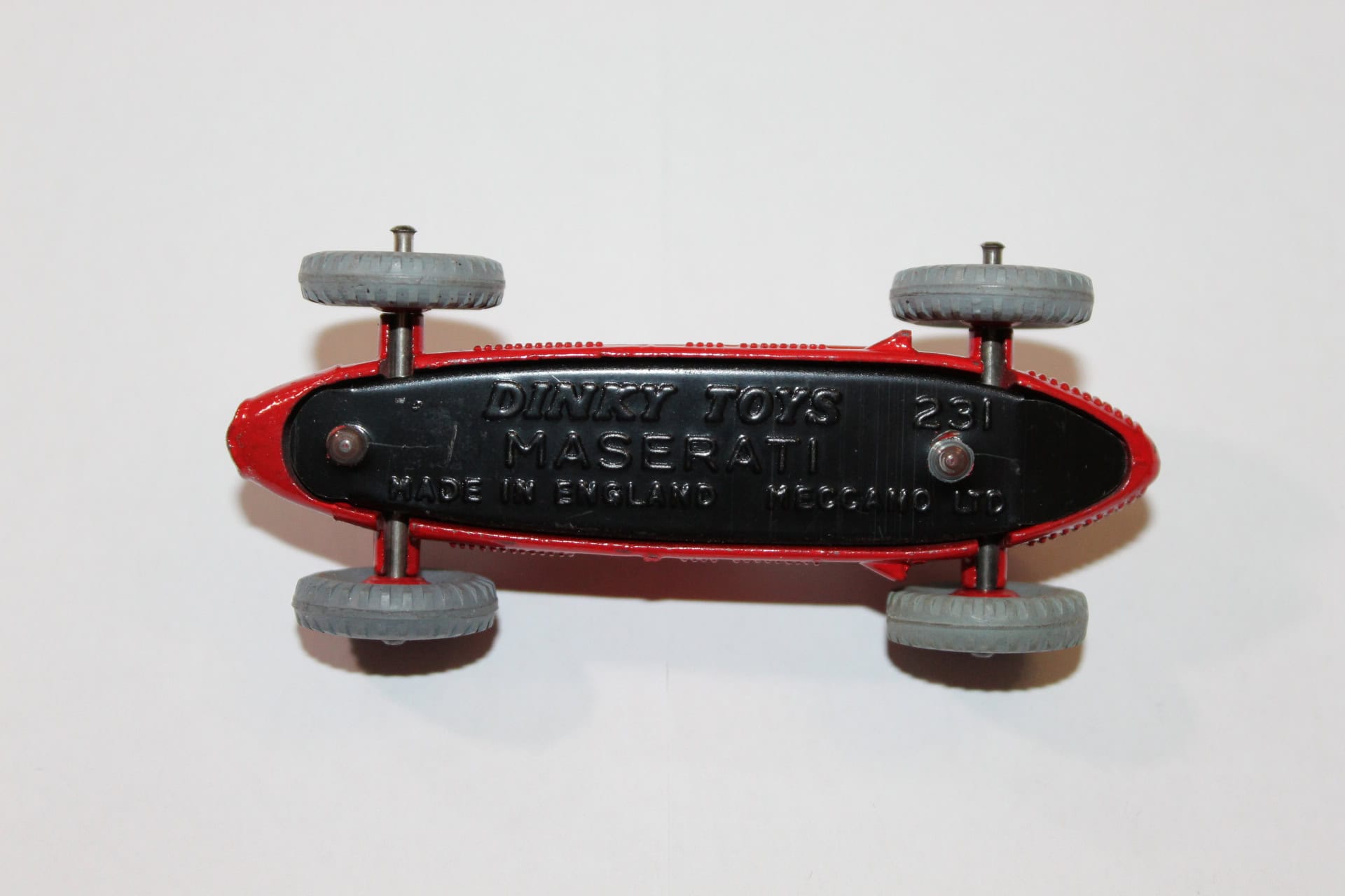 Vintage Dinky Toys Maserati racing car model, collectible diecast toy for enthusiasts.