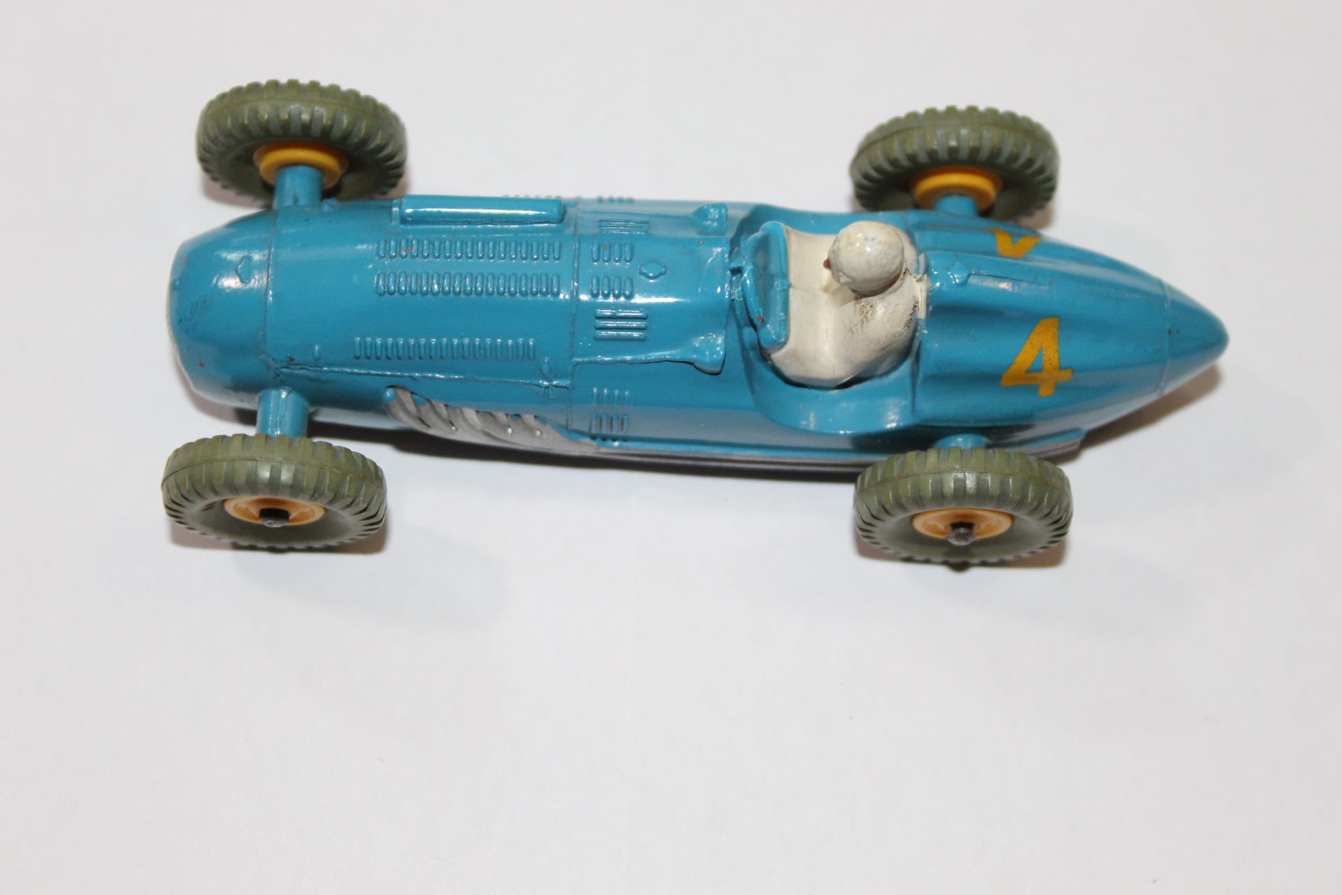 Vintage Dinky Toys 231 Maserati racing car model, blue with yellow number 4, collectible diecast veh.
