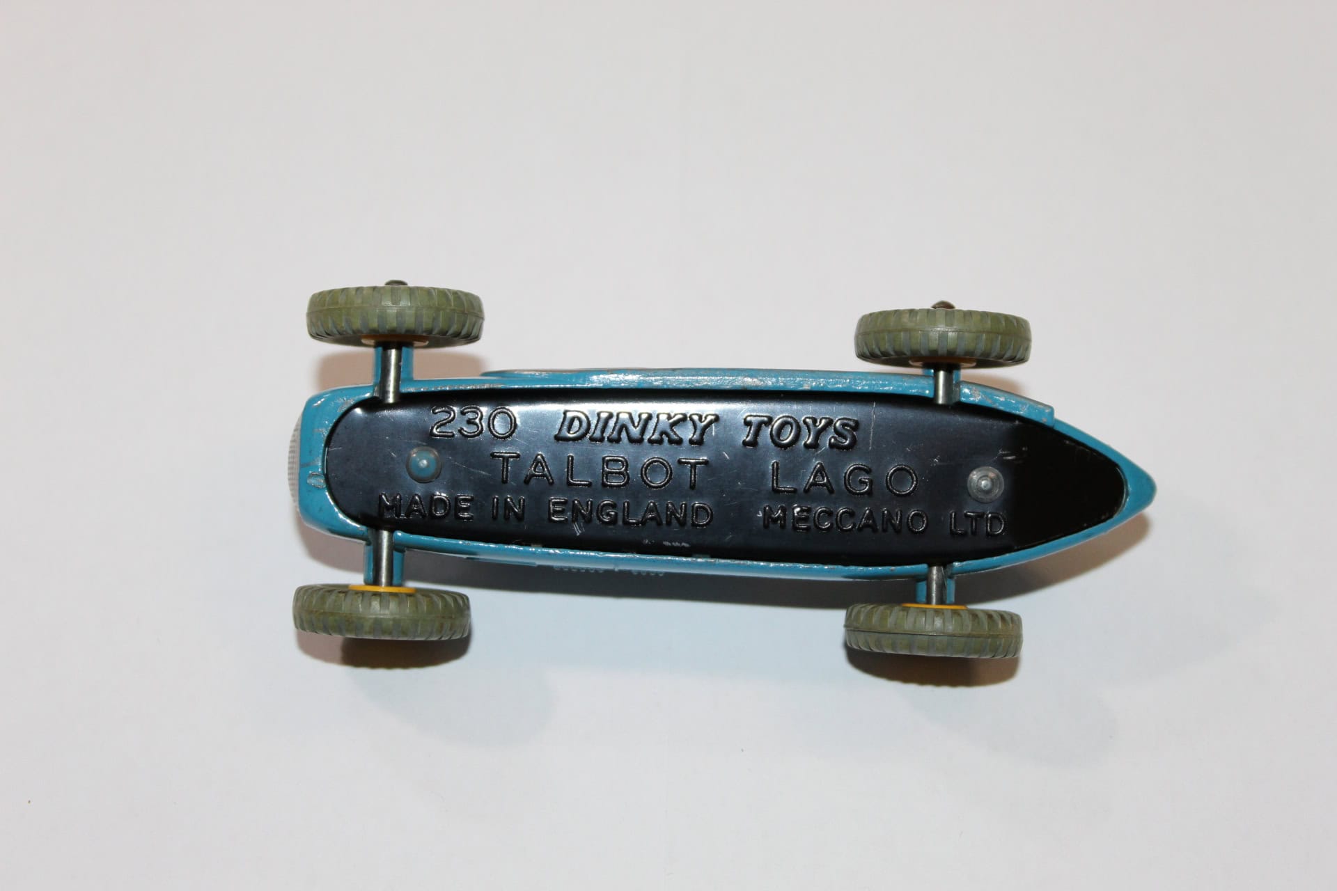 Vintage Dinky Toys Maserati racing car model, detailed miniature collectible for racing enthusiasts.