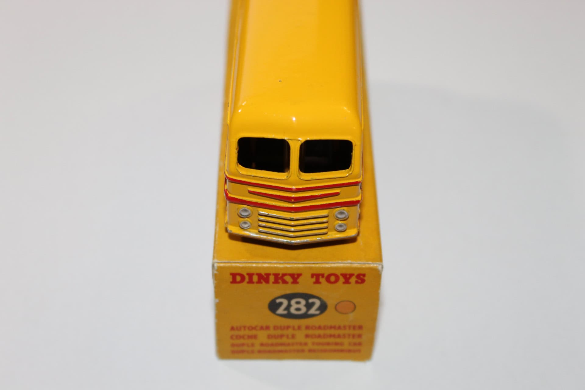 Vintage Dinky Toys 170 Ford Forder Lowline diecast model in yellow.