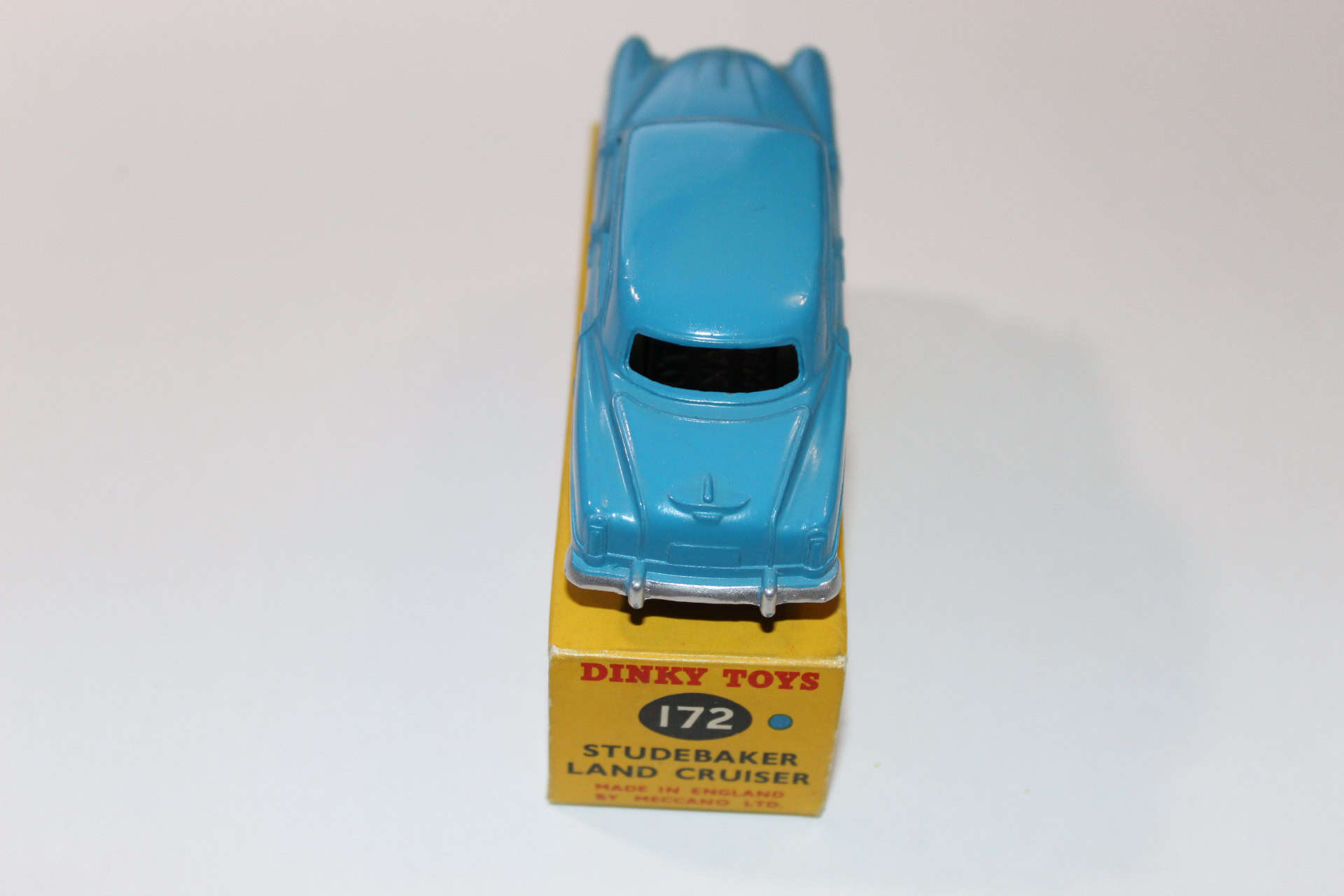 Dinky Toys 172 Studebaker Land Cruiser diecast model on display.
