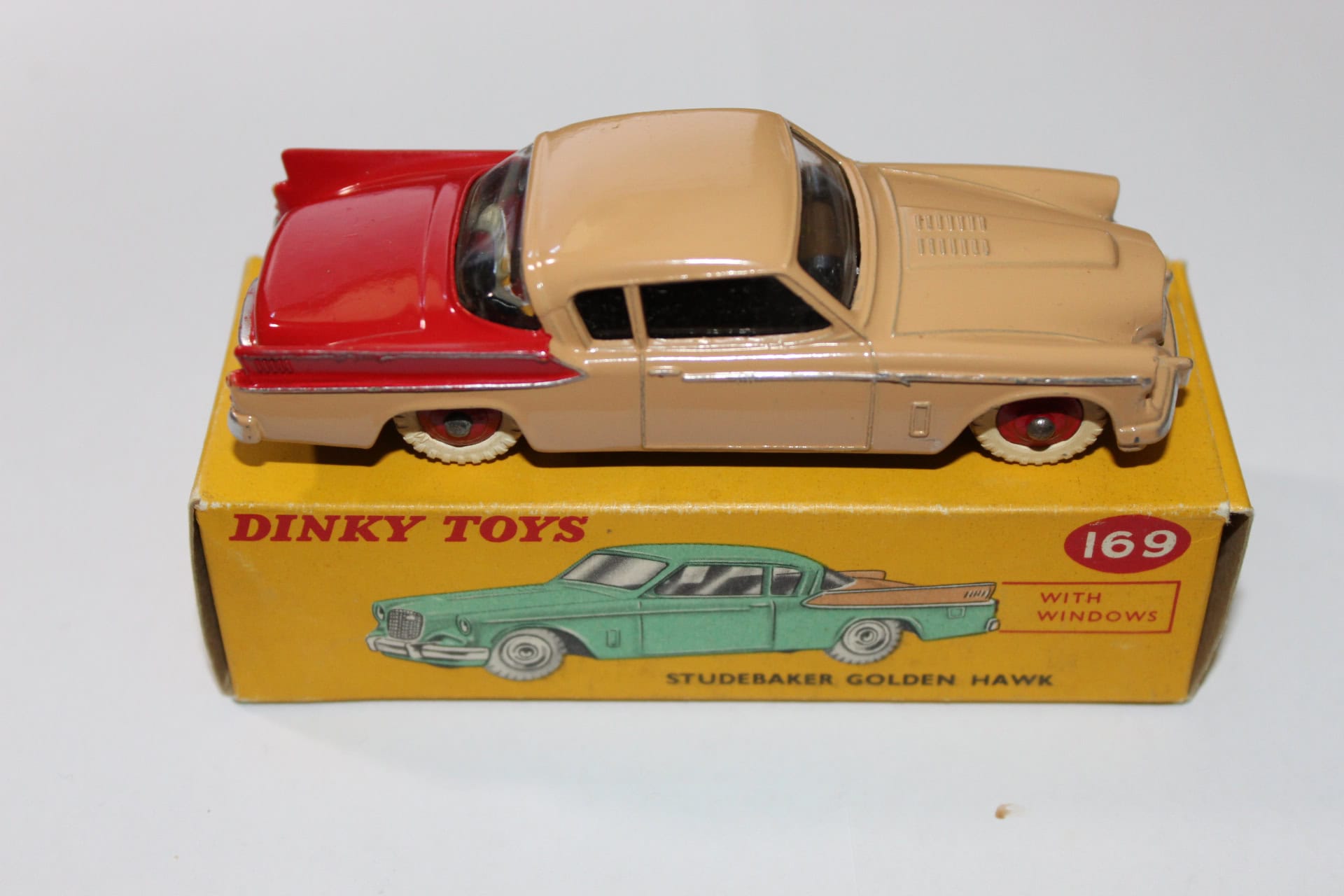 Vintage Dinky Toys 169 Studebaker Golden Hawk model car with original box.