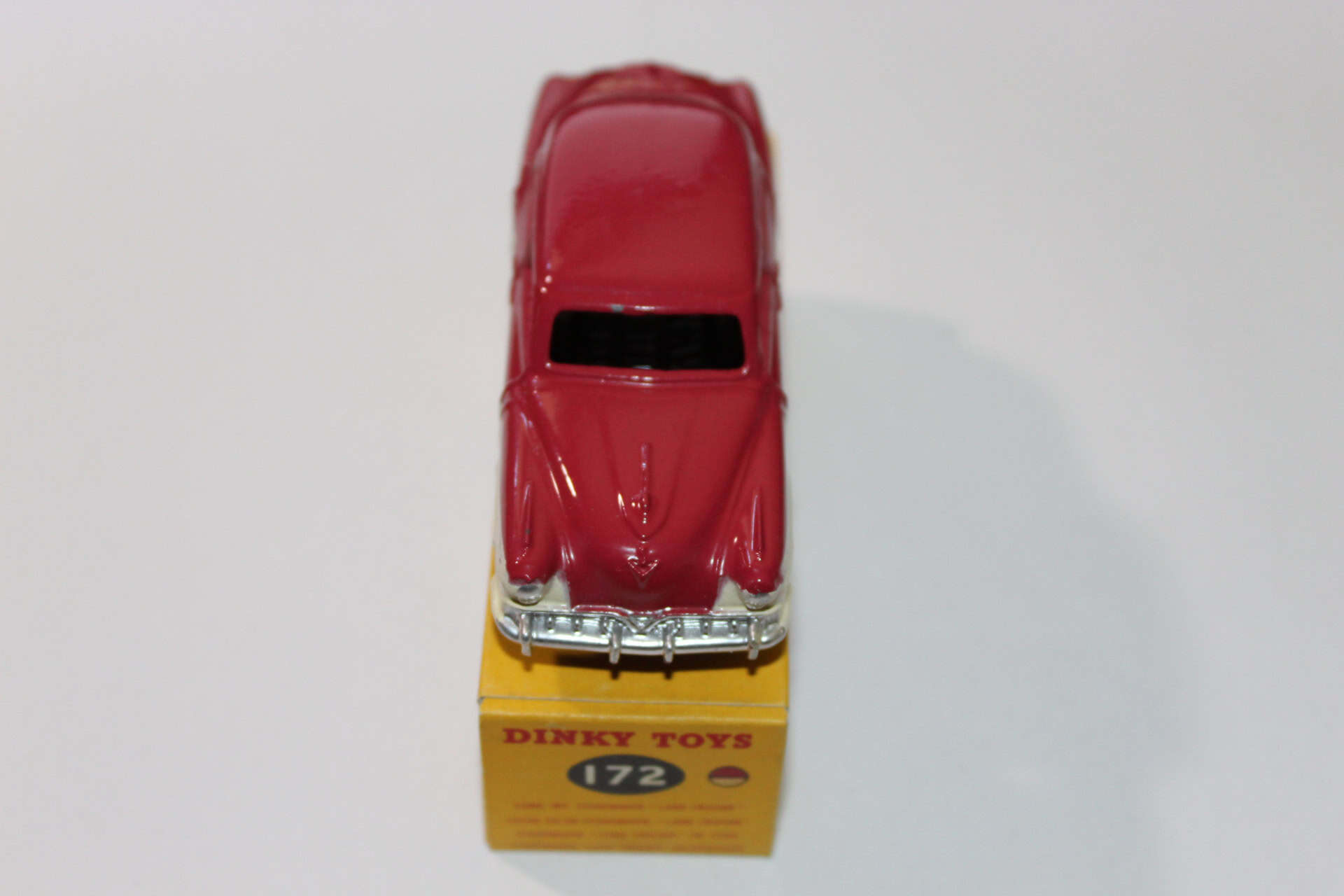 Dinky Toys 169 Studebaker Golden Hawk diecast model car on display, collectible vintage toy.
