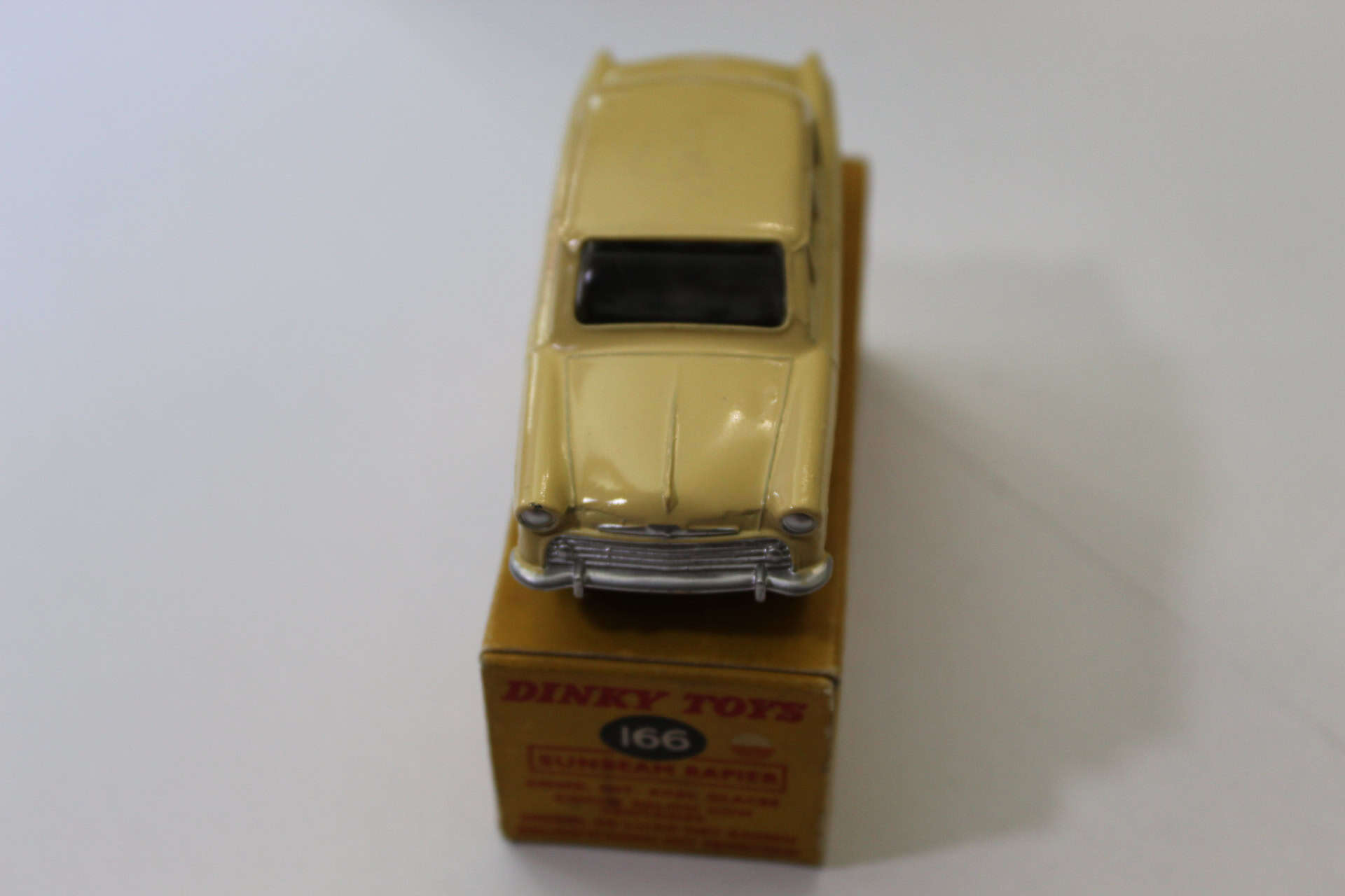 Dinky Toys 166 Sunbeam Rapier diecast model car on original box.