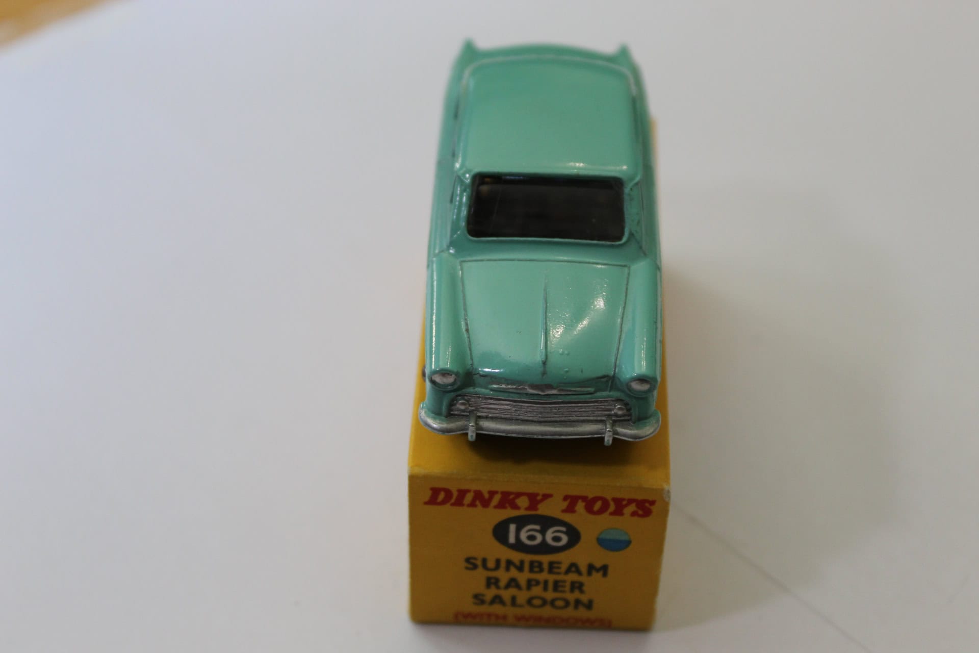 Vintage Dinky Toys 166 Sunbeam Rapier model car on original box.