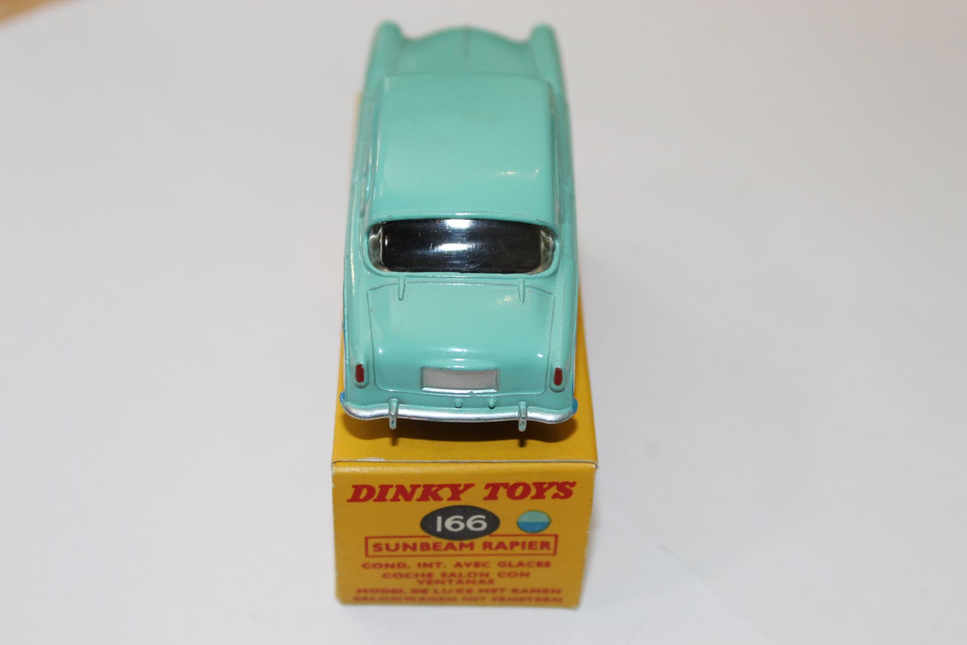 Dinky Toys 166 Sunbeam Rapier diecast model car, vintage toy collectible.