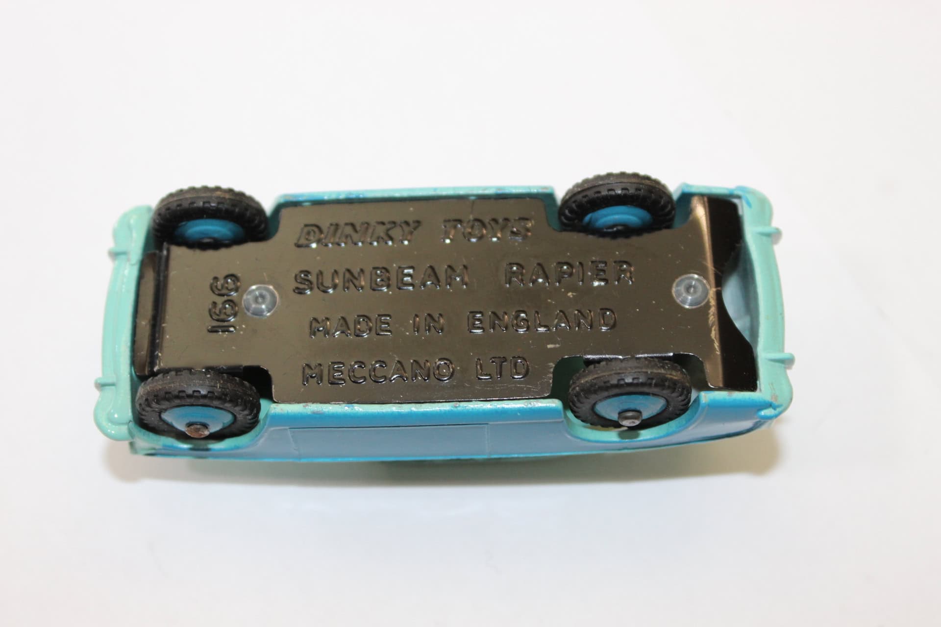 Detailed diecast model of Sunbeam Rapier car, Dinky Toys 166, made in England.
