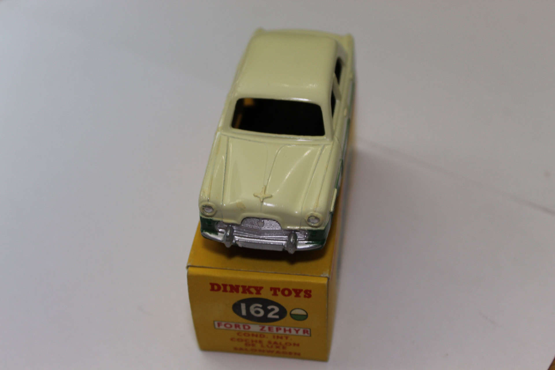 Dinky Toys 162 Ford Zephyr in green and cream, detailed diecast model on original box.